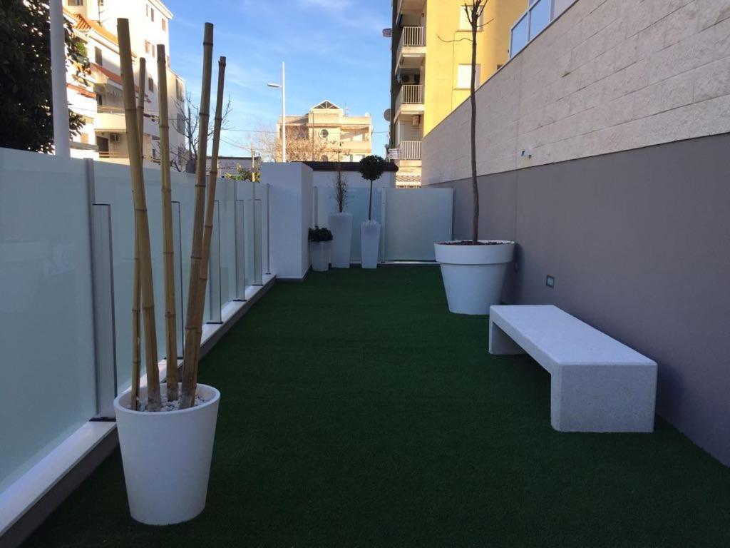 Edificio Attikos - Solo Familias Apartment Gandia Exterior photo